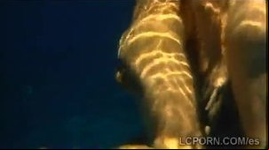 2 Petite hotties from Spain tease a lucky perv in the pool